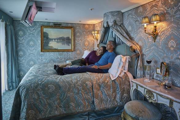 UNIWORLD Boutique River Cruises S.S. Maria Theresa Suite Lifestyle 1.jpg